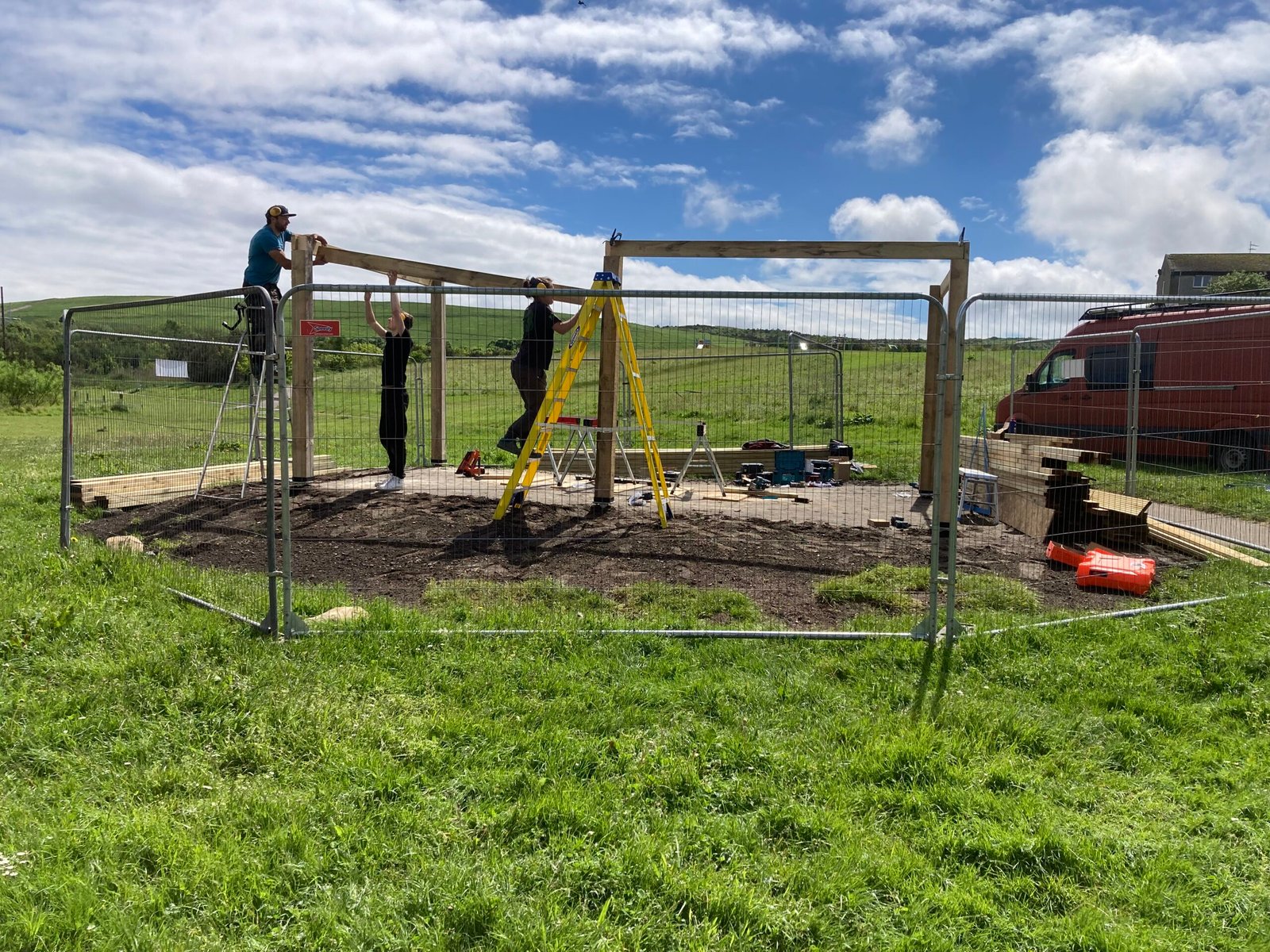 The Outdoor Classroom wooden columns being connected.